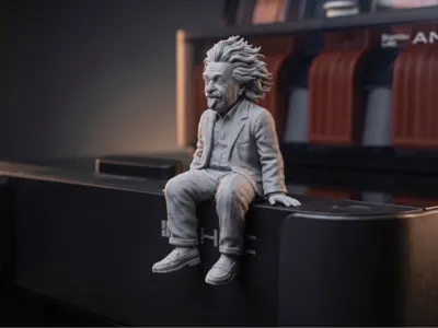 026 Cheeky Sitting Einstein - Monitor Buddy