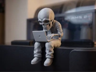052 The Overworked Programmer - Skull Shelf Sitter