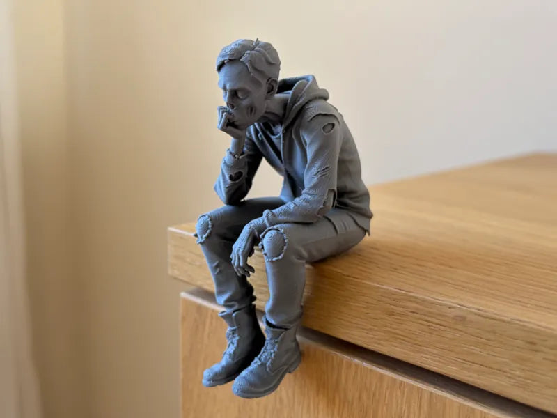 Pensive Zombie – Ledge Sitter Figure