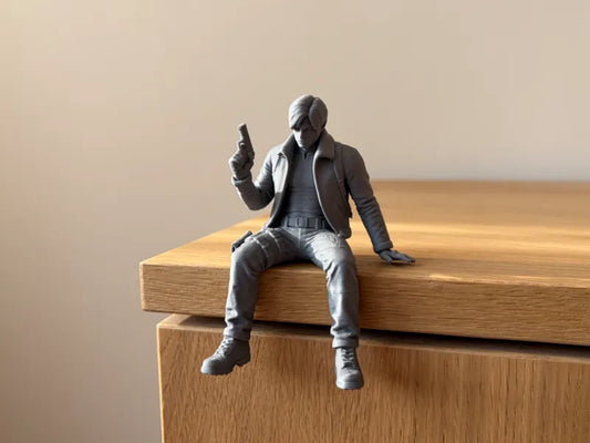 072 Leon Sitting on Ledge Shelf Figure  Resident Evil